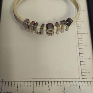 BCBGeneration "MUSHY" White Word Bracelet